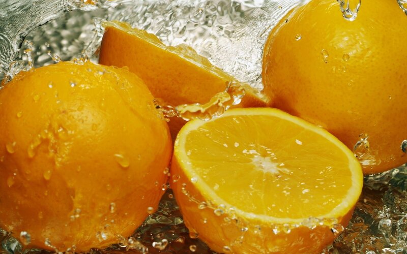 Sliced Oranges in Water — Orange, Vibrant