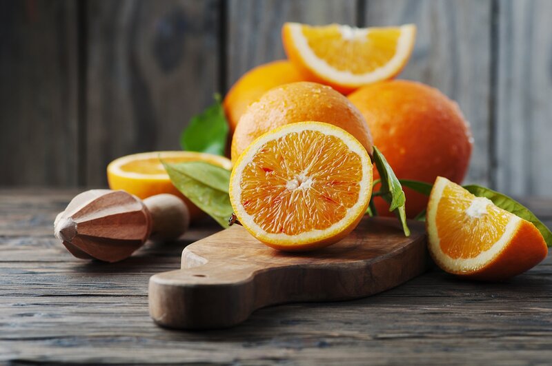Sliced Oranges on Cutting Board