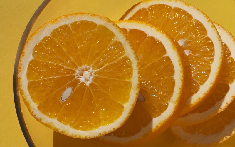 Sliced Oranges on Plate
