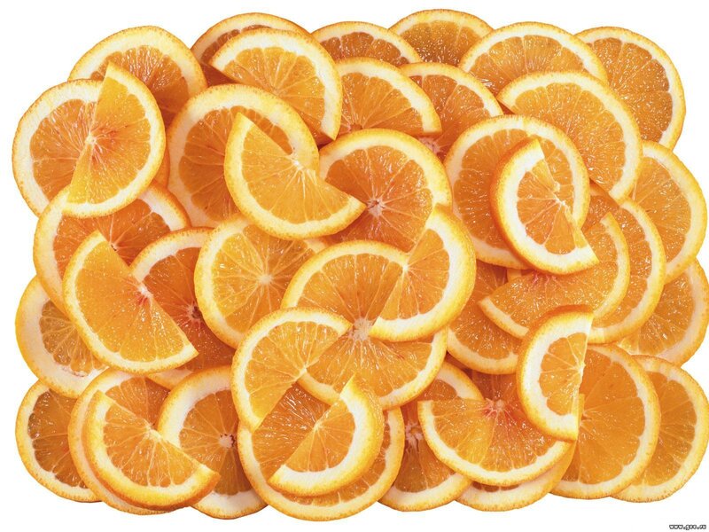 sliced oranges on white