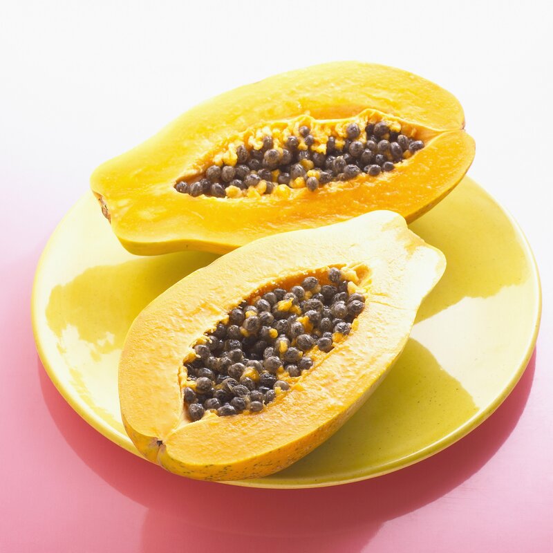 sliced papaya on a plate