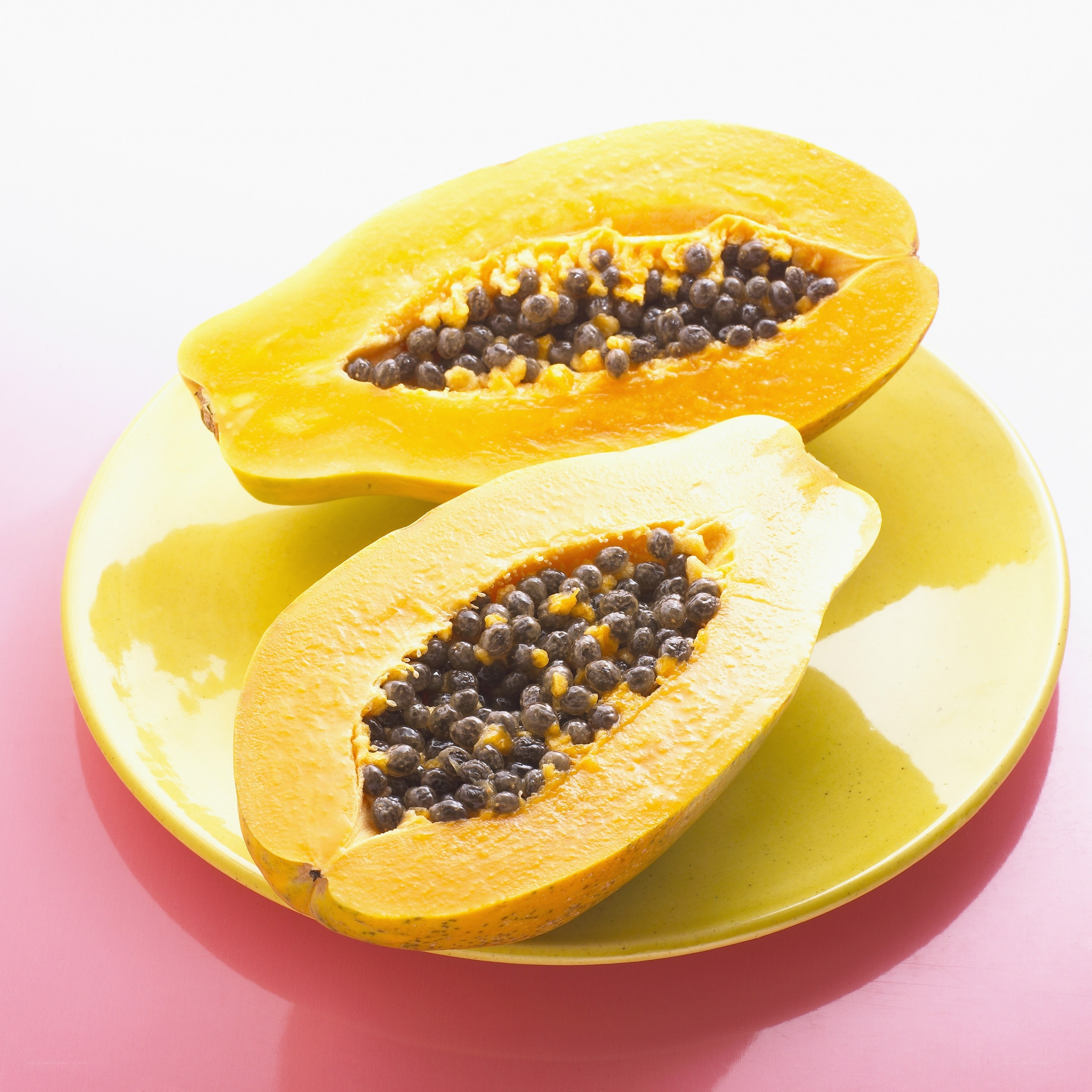 sliced papaya on a plate