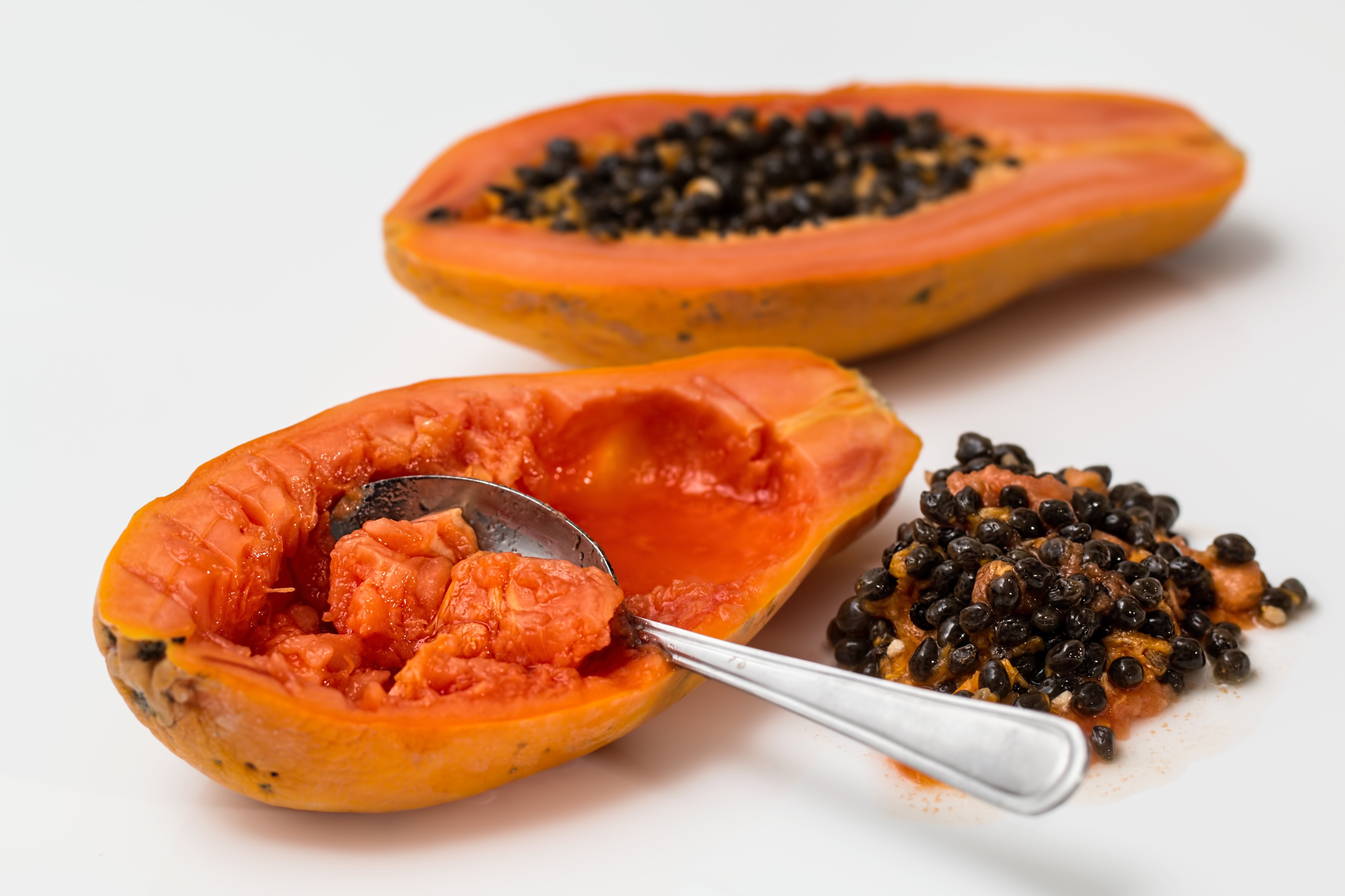 Sliced papaya with seeds