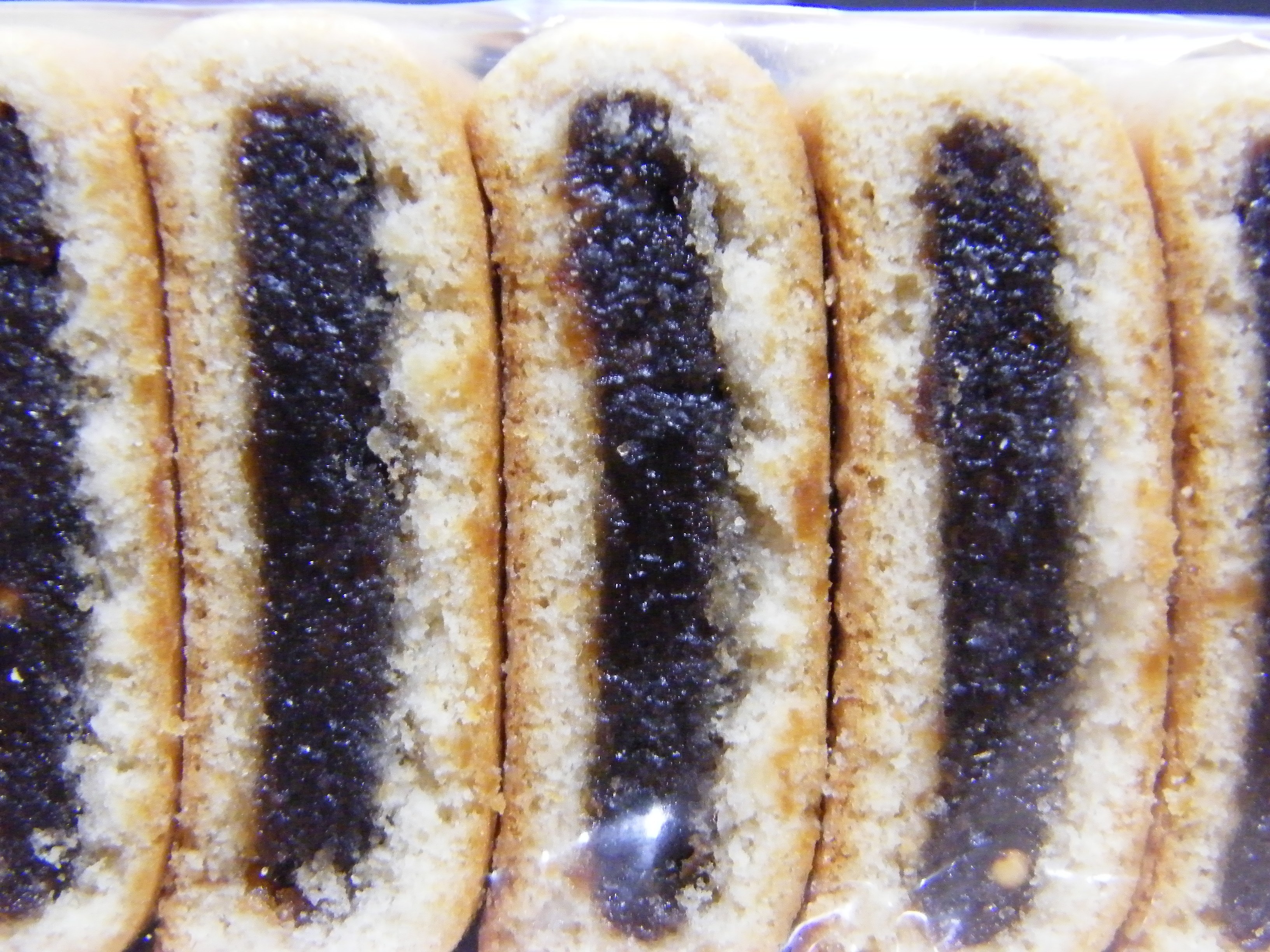 sliced pastries with dark filling