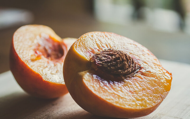 Sliced Peach on Wood