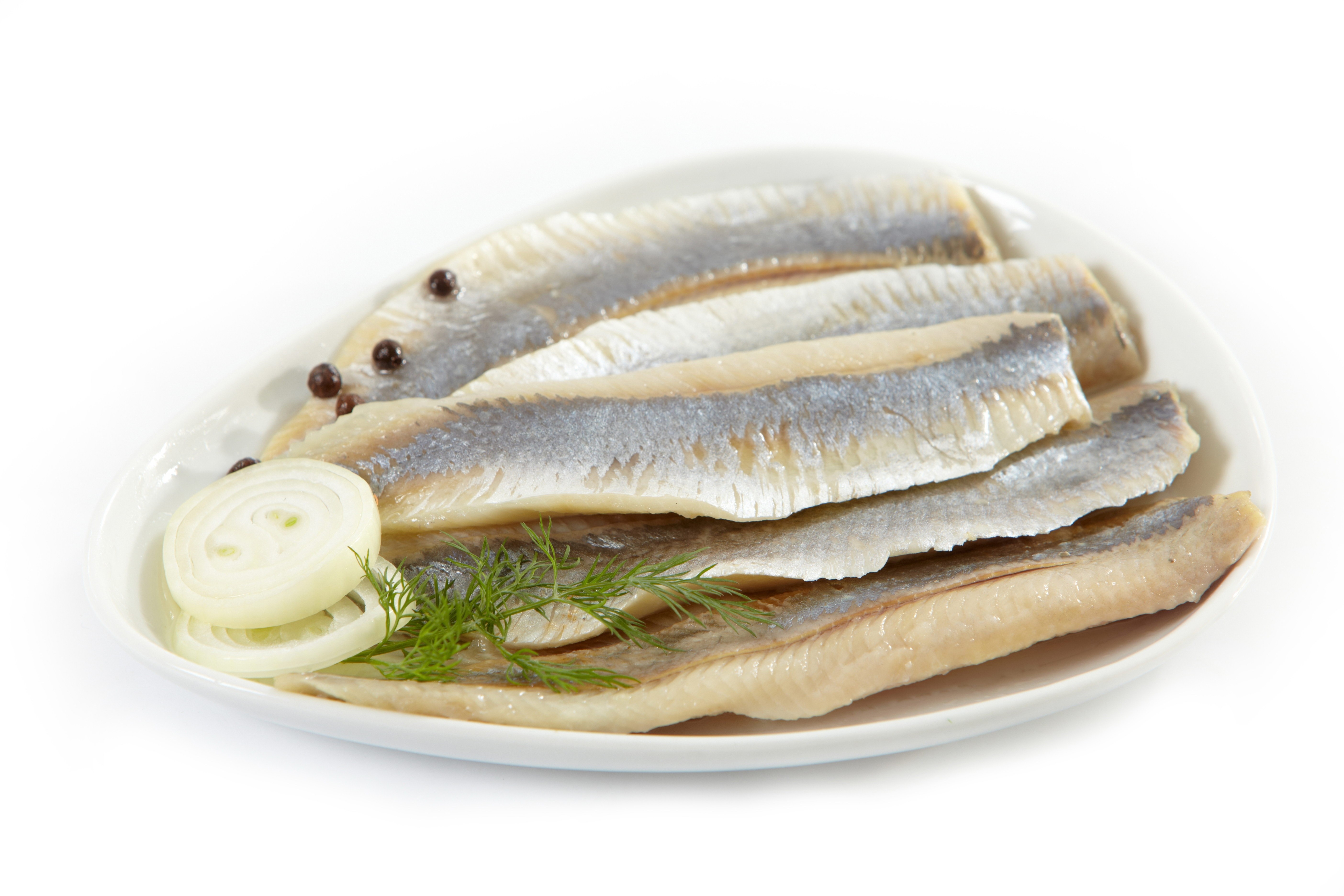 sliced pickled herring with onion
