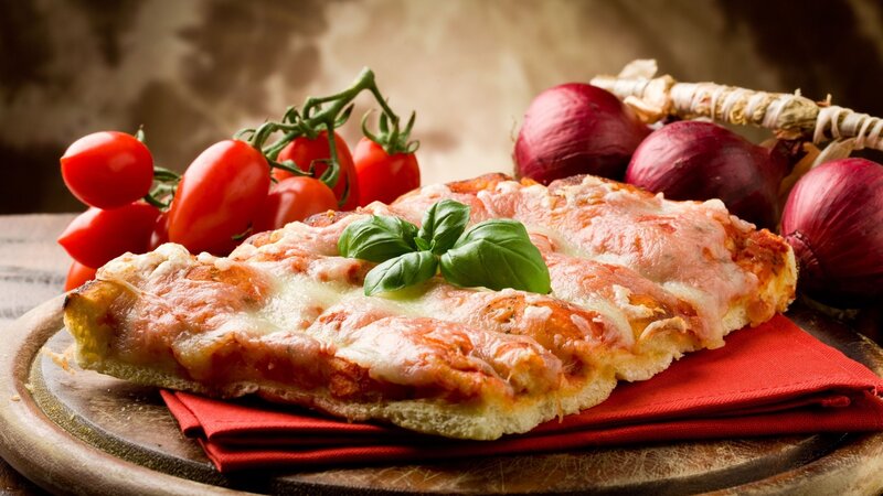 Sliced Pizza on Wood