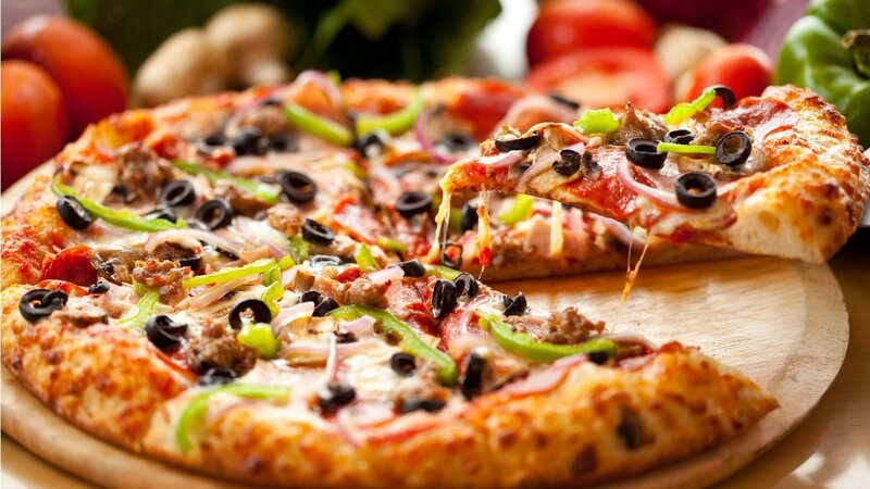 Sliced pizza with toppings