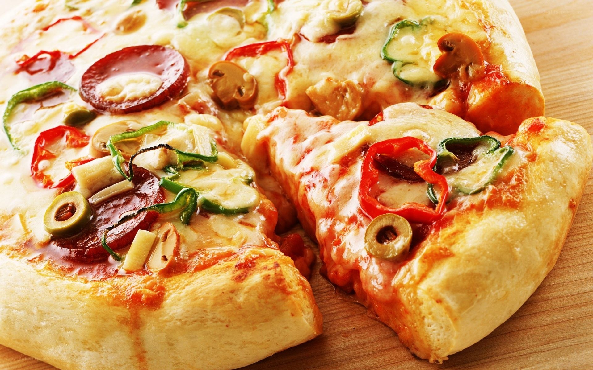 Sliced pizza with vegetables