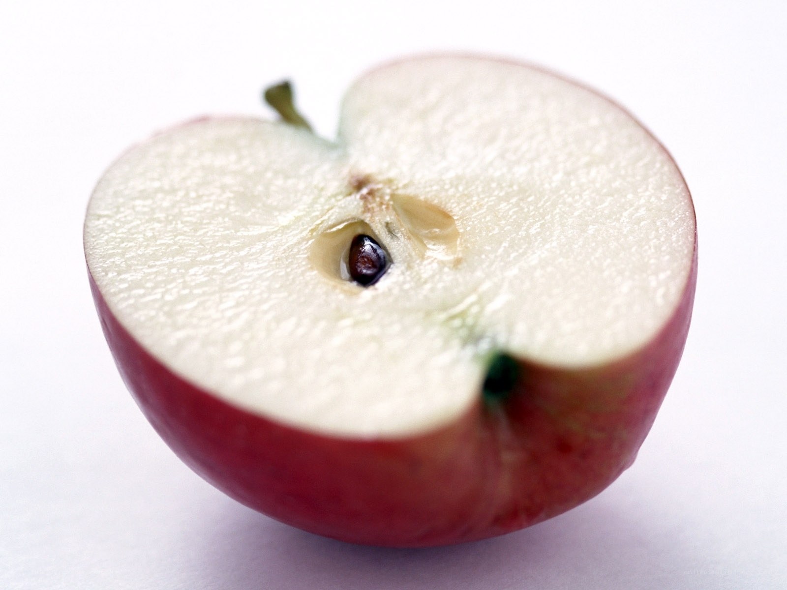 sliced red apple