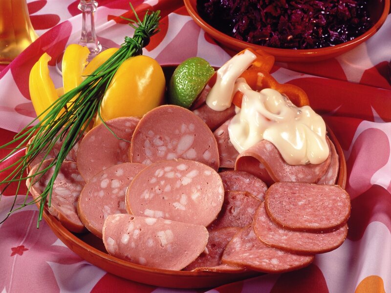 Sliced sausage platter with condiments