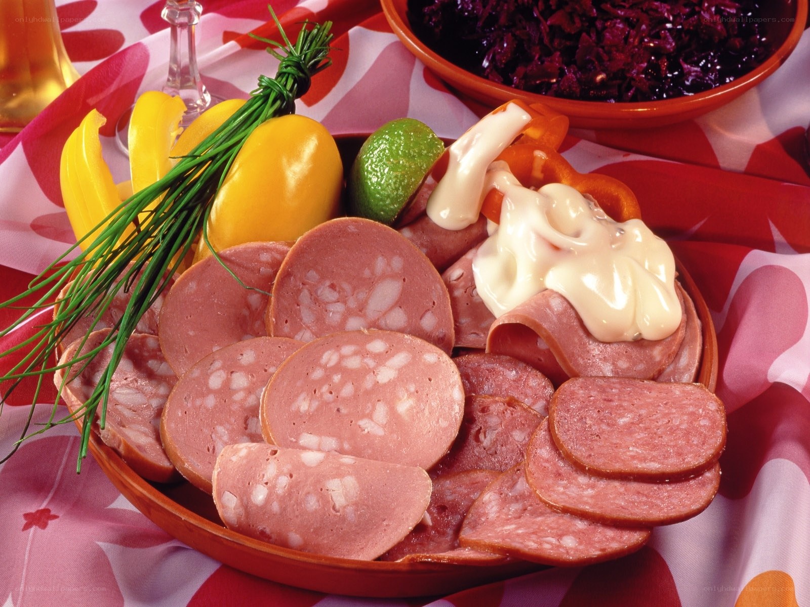 Sliced sausage platter with condiments