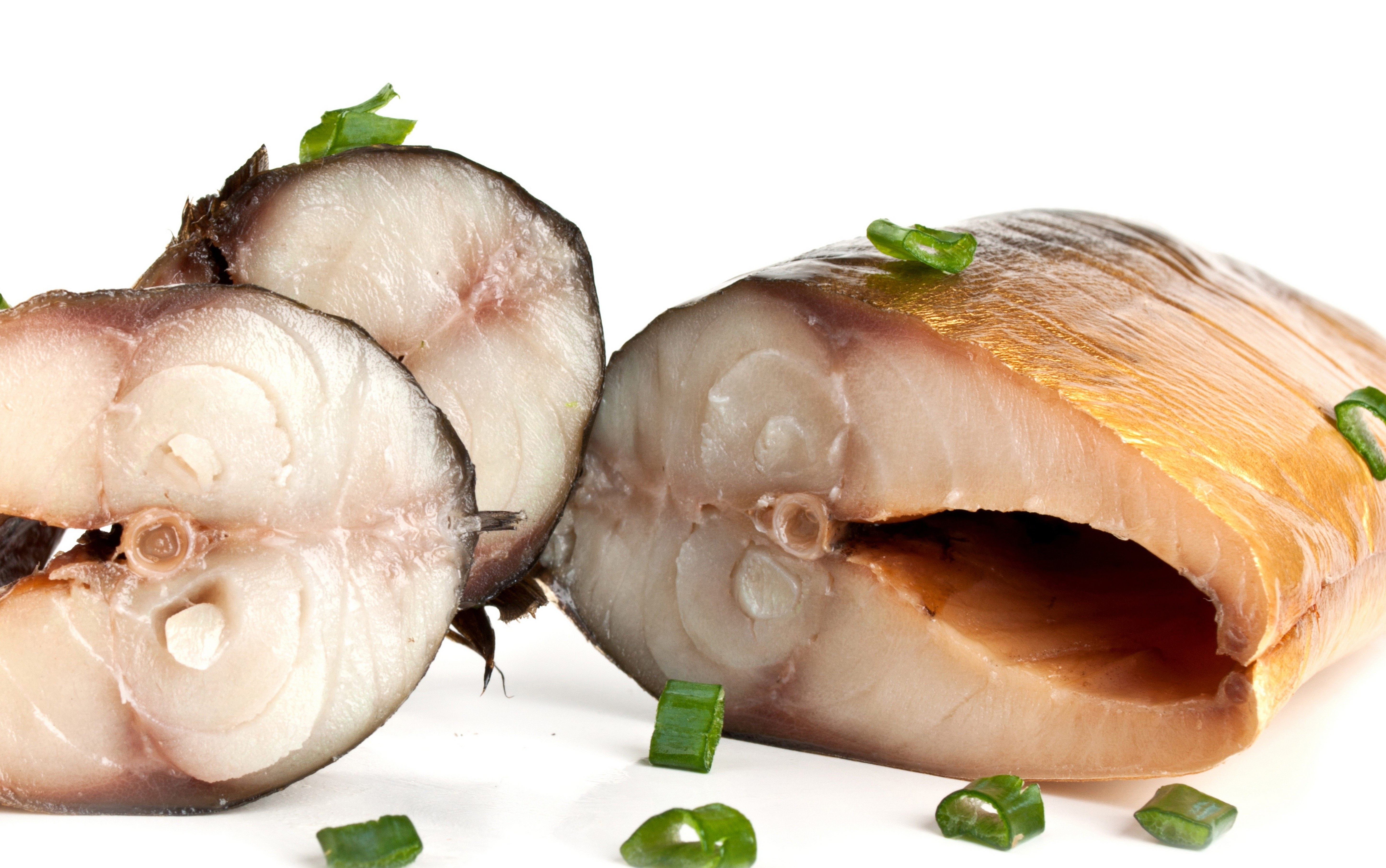 sliced smoked fish with green onions