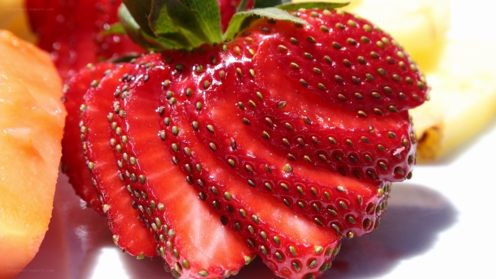 sliced strawberries with fruit