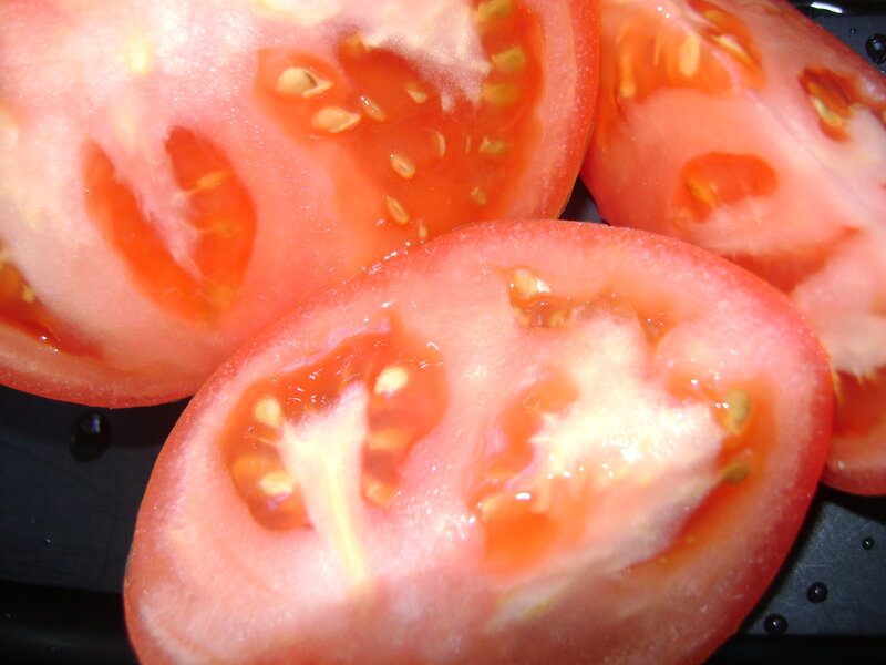sliced tomatoes on a tray