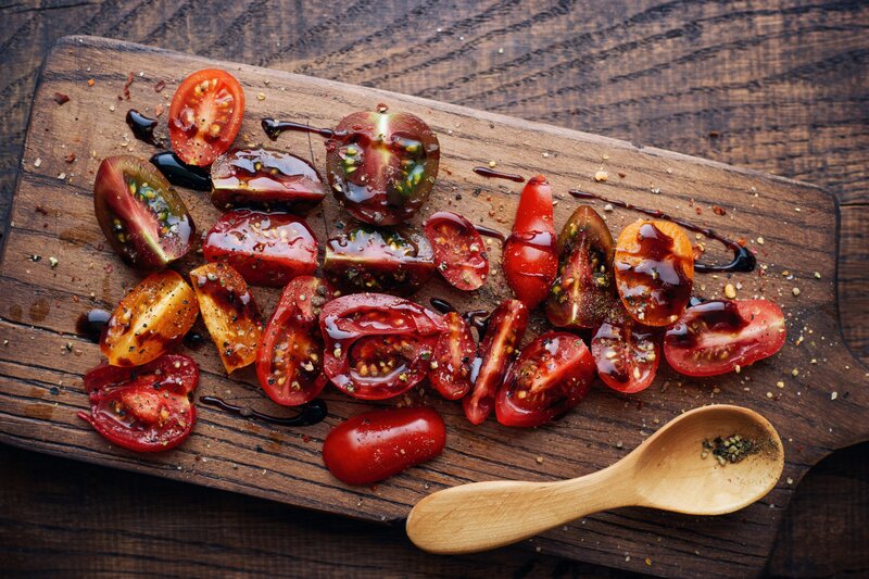 Sliced Tomatoes on Board