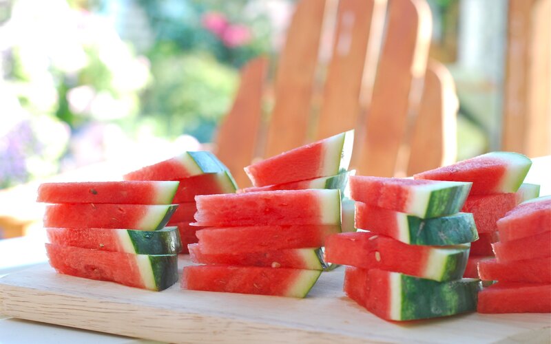 Sliced watermelon on a cutting board
