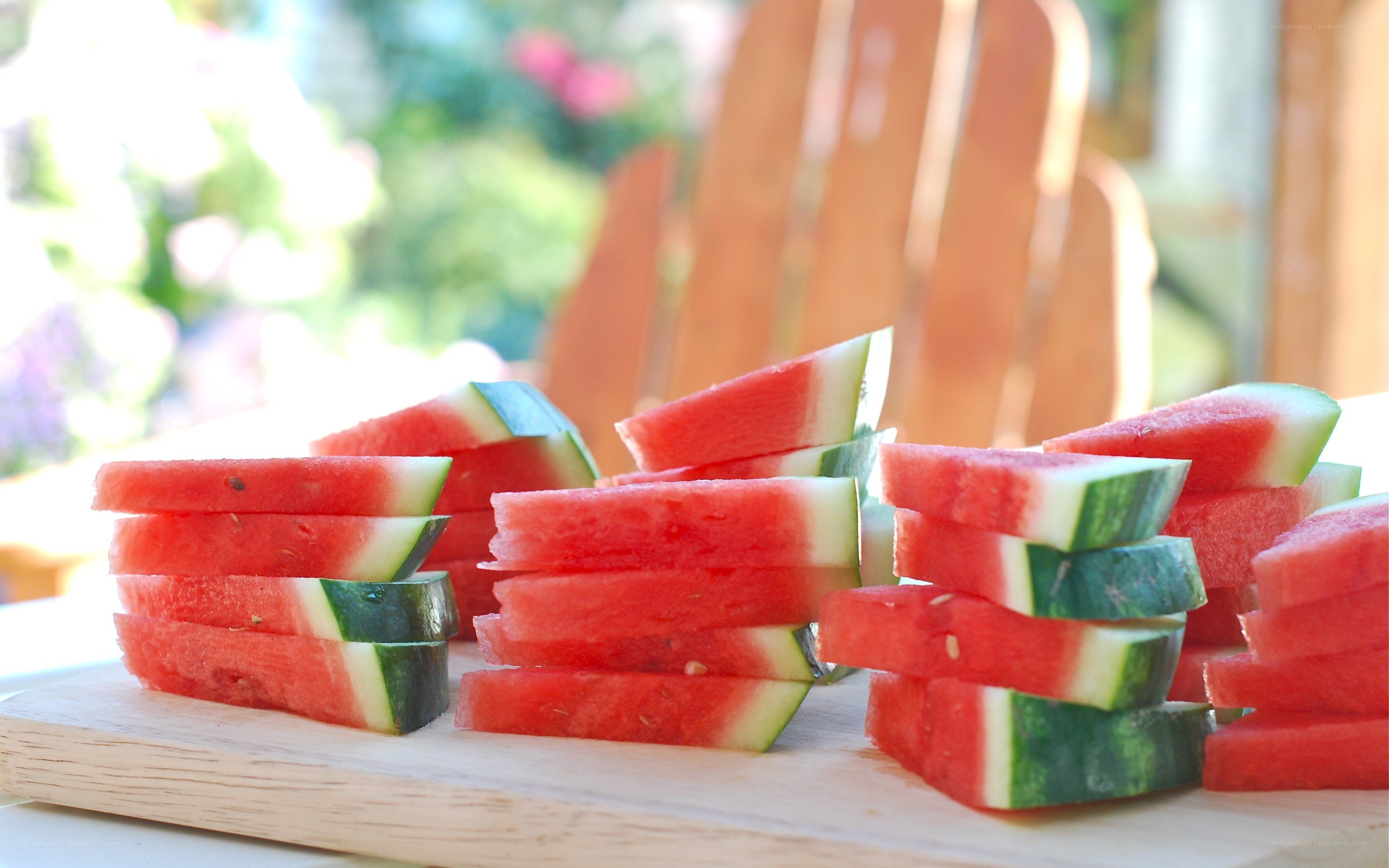 Sliced watermelon on a cutting board