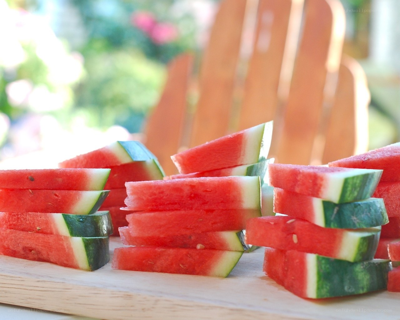 Sliced watermelon on a cutting board