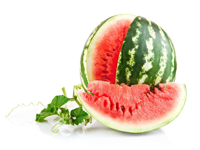 sliced watermelon with leaves