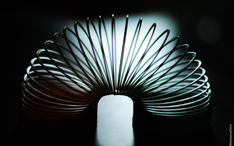 Slinky toy in dark setting