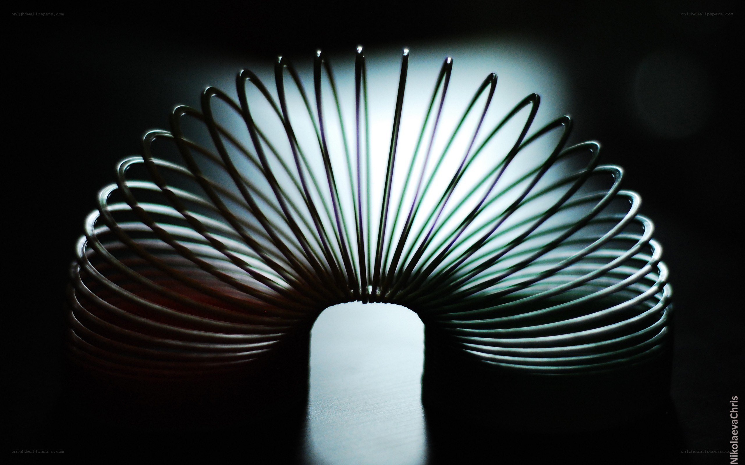 Slinky toy in dark setting