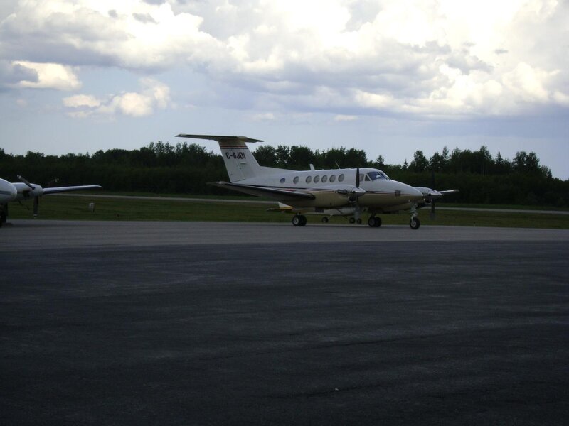 Small aircraft on tarmac
