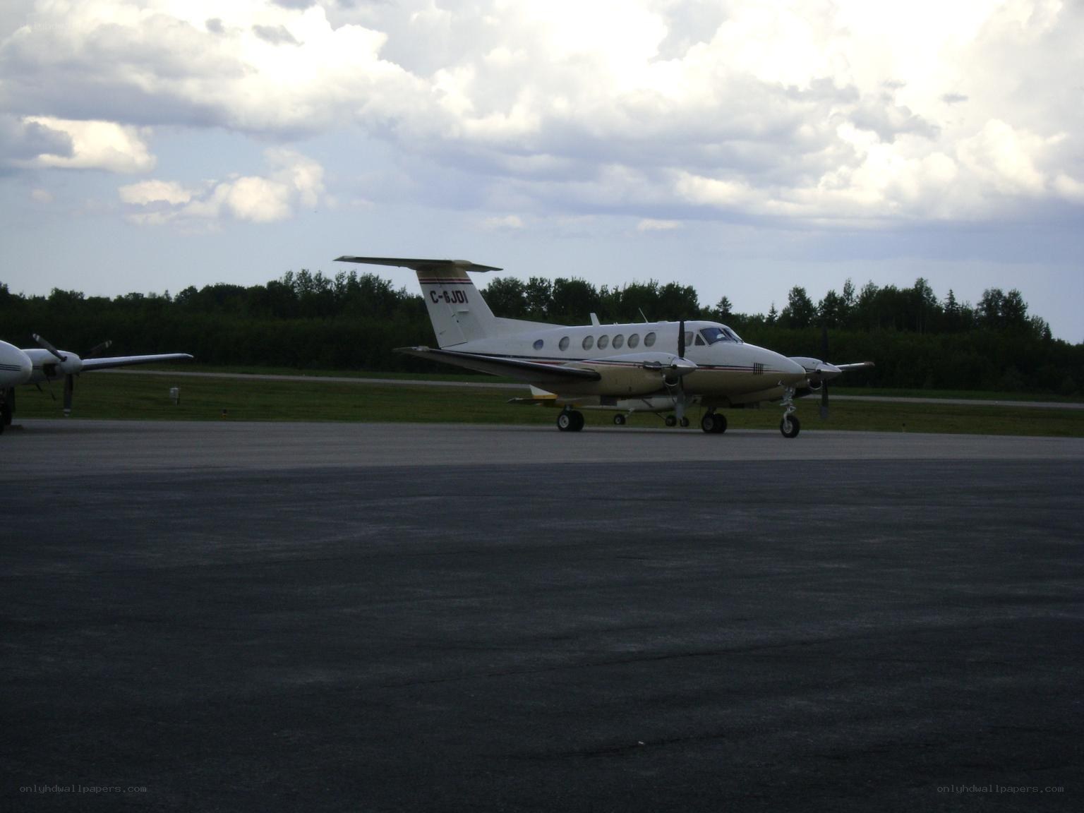 Small aircraft on tarmac