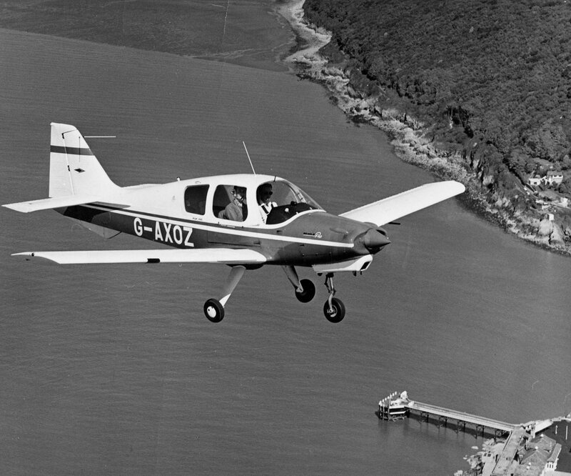 Small Airplane in Flight — Black