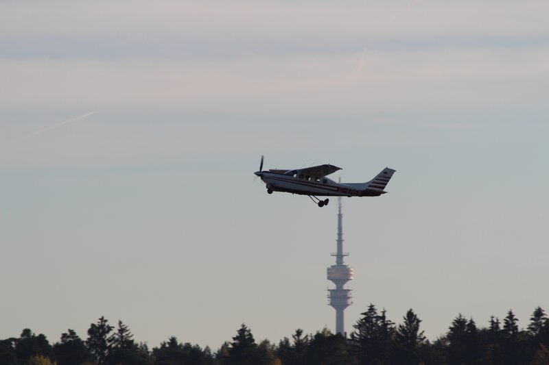 Small Airplane in Flight — Gray, Calm