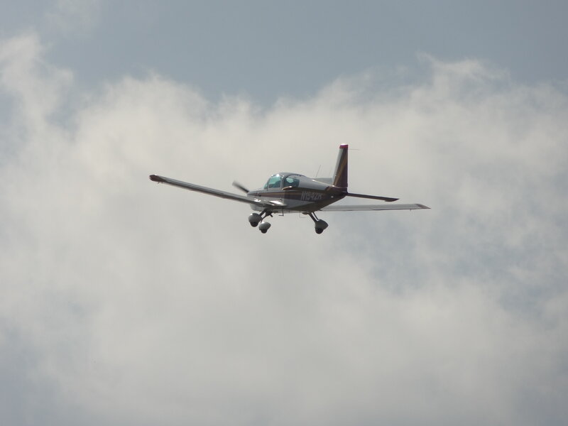Small Airplane in Flight — Gray