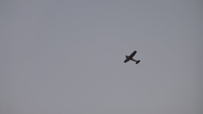 Small Airplane in Sky