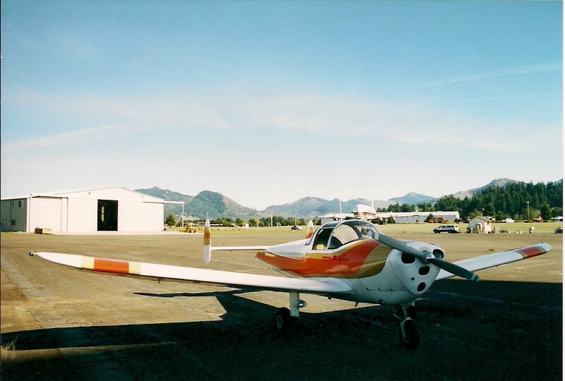 Small Airplane on Tarmac — White