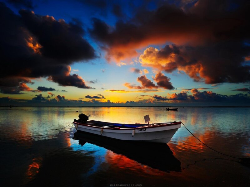 Small Boat at Sunset — Blue, Dramatic, Photograph, Sky