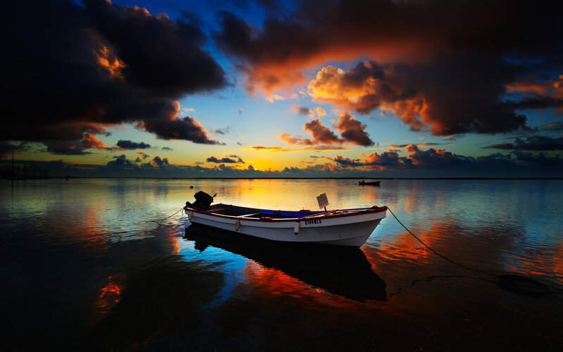 Small Boat at Sunset — Blue