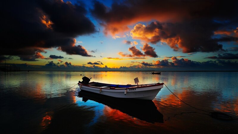 Small Boat at Sunset — Orange, Dramatic, Photograph, Sky, Water