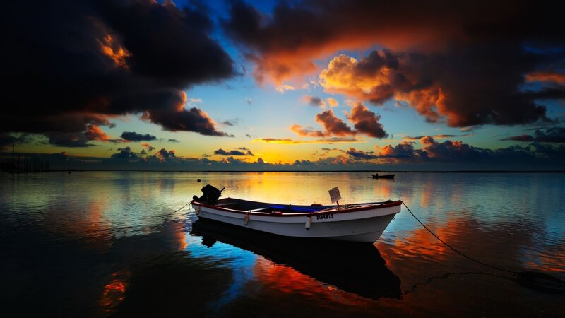 Small Boat at Sunset — Orange, Dramatic