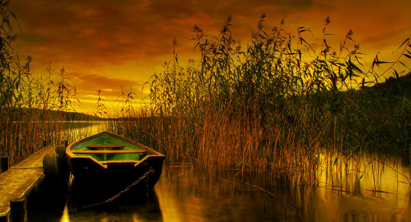 Small Boat at Sunset — Orange, Serene