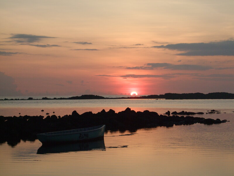 Small Boat at Sunset