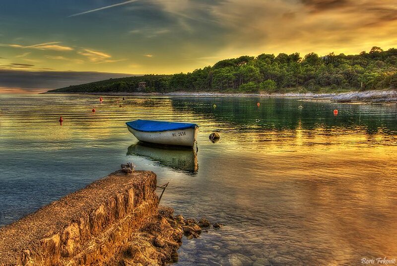 Small Boat in Calm Water