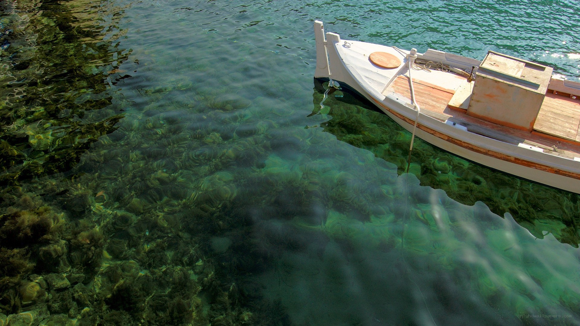 Small boat in clear water