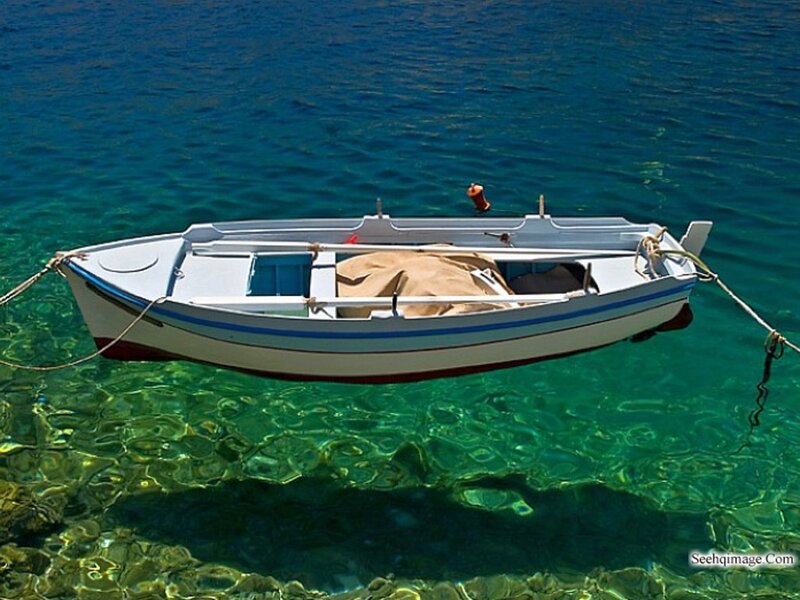 Small Boat in Clear Water — Blue, Serene