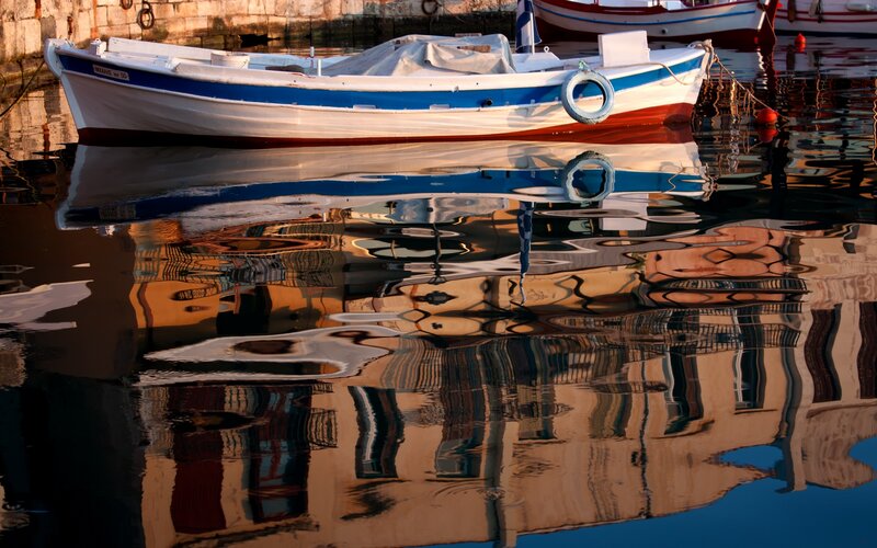 Small Boat in Harbor — Blue