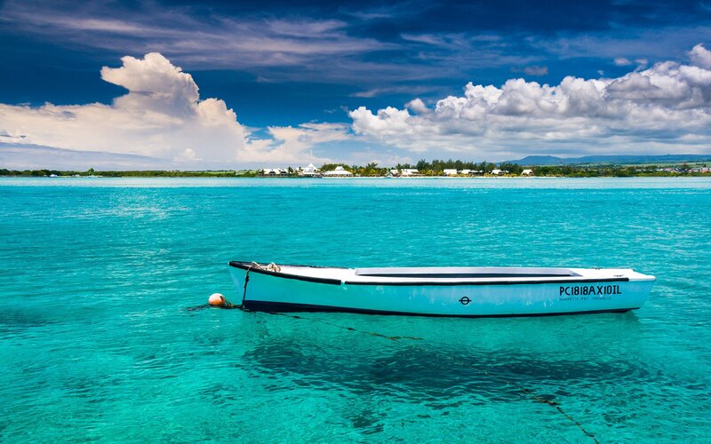 Small Boat in Turquoise Water — Blue, Serene