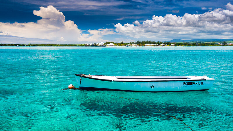 Small Boat in Turquoise Water