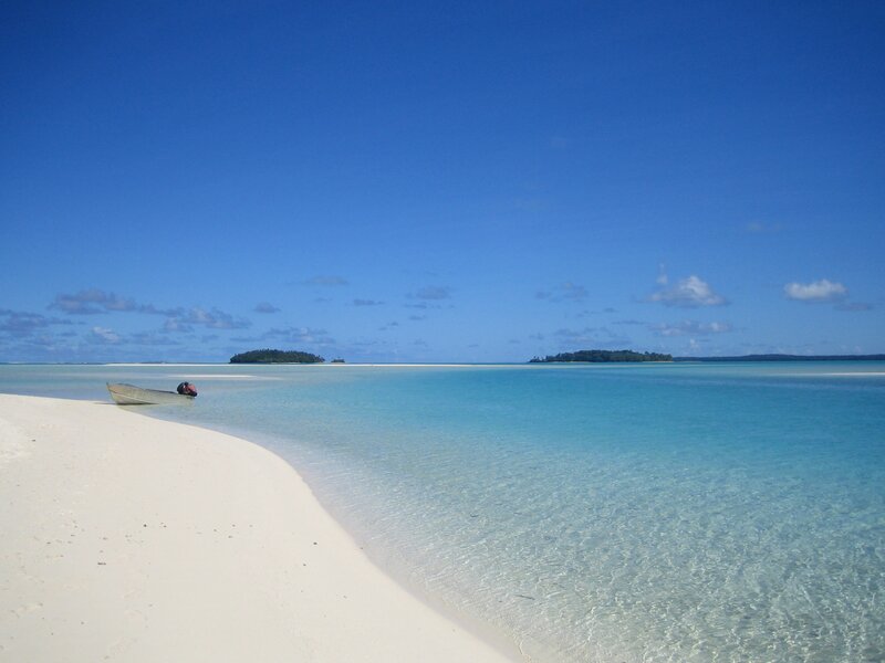 Small Boat on Beach — Blue, Serene, Afternoon, Photograph, Islands