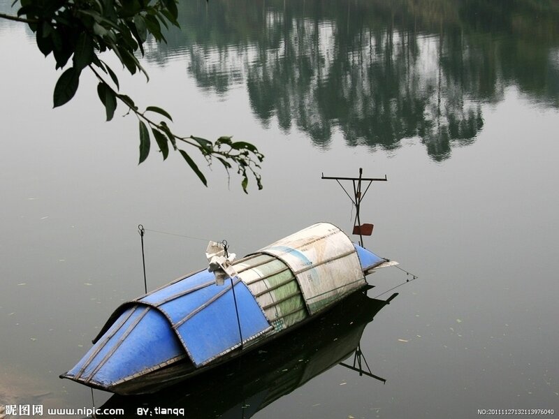 Small boat on calm water