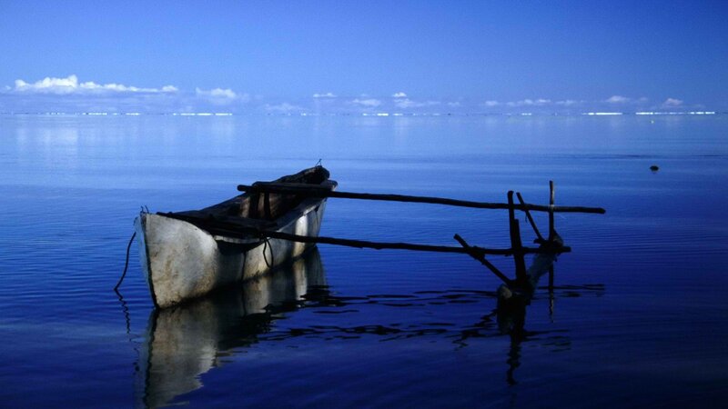Small Boat on Calm Water — Blue, Serene, Afternoon, Photograph, Oar