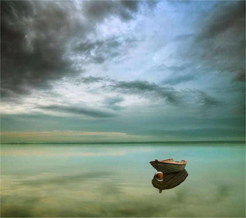 Small Boat on Calm Water — Blue