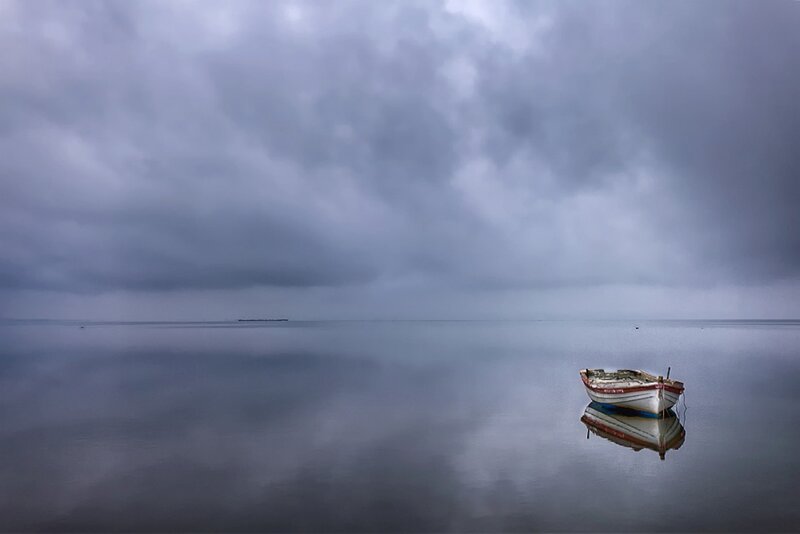 Small Boat on Calm Water — Gray
